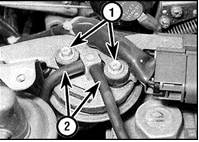 1. Клапан смонтирован в левой части всасывающего коллектора (1 – винты, 2 – вакуумные