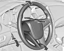 Отоприте рычаг, отрегулируйте рулевое колесо, затем зафиксируйте