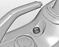 Прикуриватель расположен в переднeeй нижней консоли.