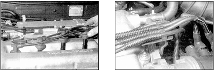1. Отсоедините высоковольтные провода от свечей зажигания, достаньте провода