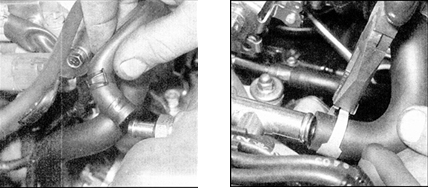 2. Ослабьте хомуты и отсоедините шланг вентиляции картера в задней части крышки