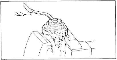 10. Извлеките ротор из тисков.