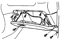 1. Отсоедините провод "массы" от аккумулятора. Отвинтите болты, вытащите бардачок